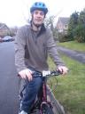 Cllr Olly Wells on bicycle